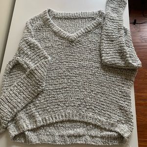 Out from under sweater